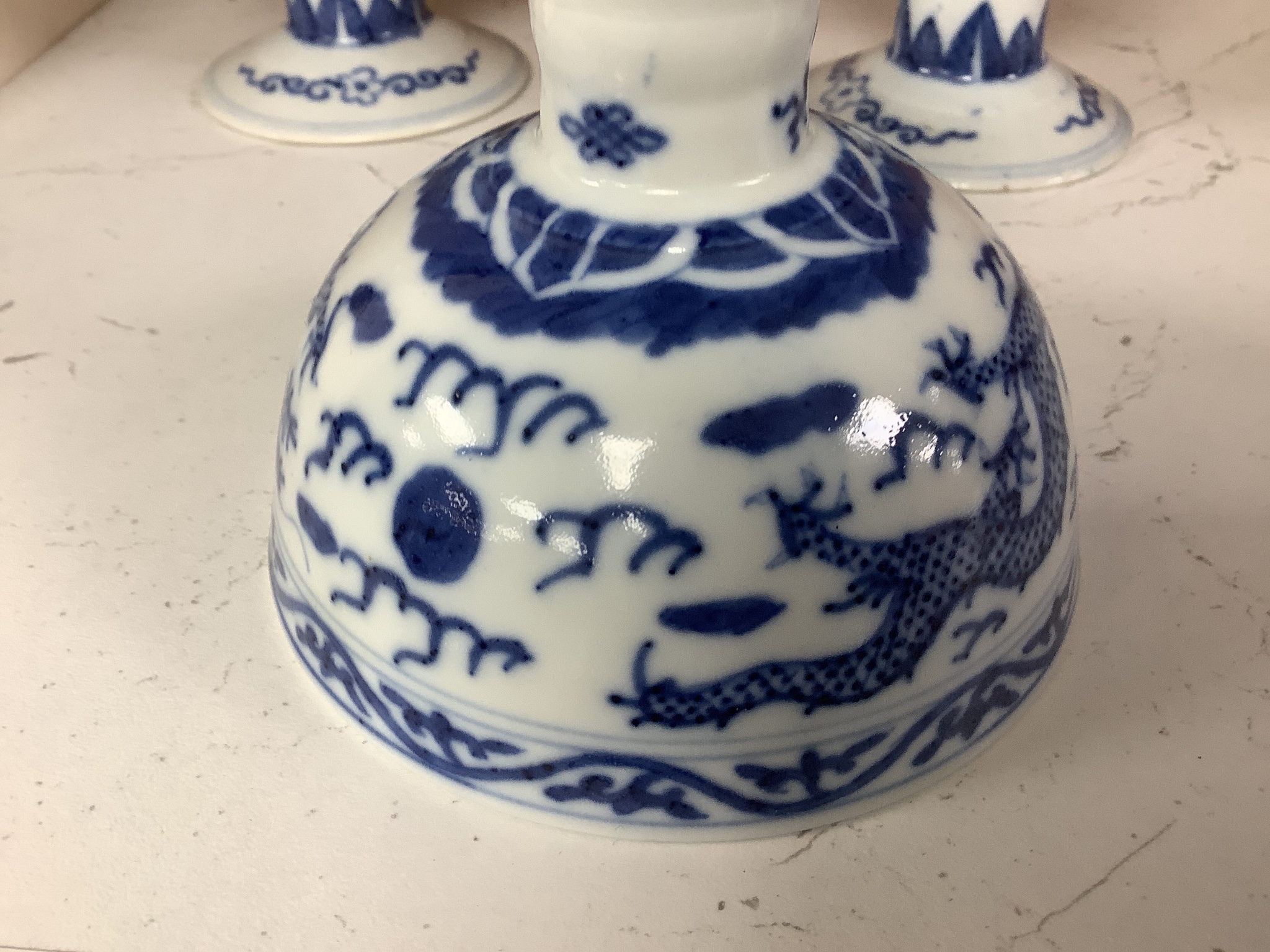 Three Chinese blue and white porcelain stem cups, c.1900, 9.5cm